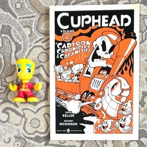 Cuphead Volume 2 Softcover Graphic Novel Comic Book and Figure.